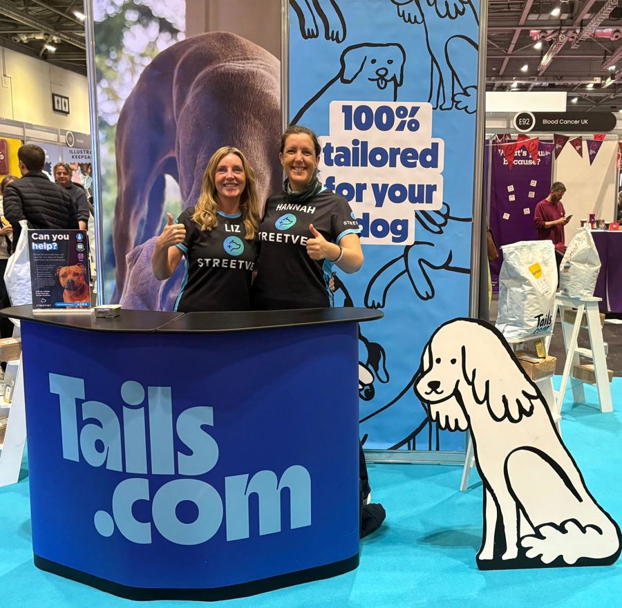 Liz and Hannah Tails stand.jpeg
